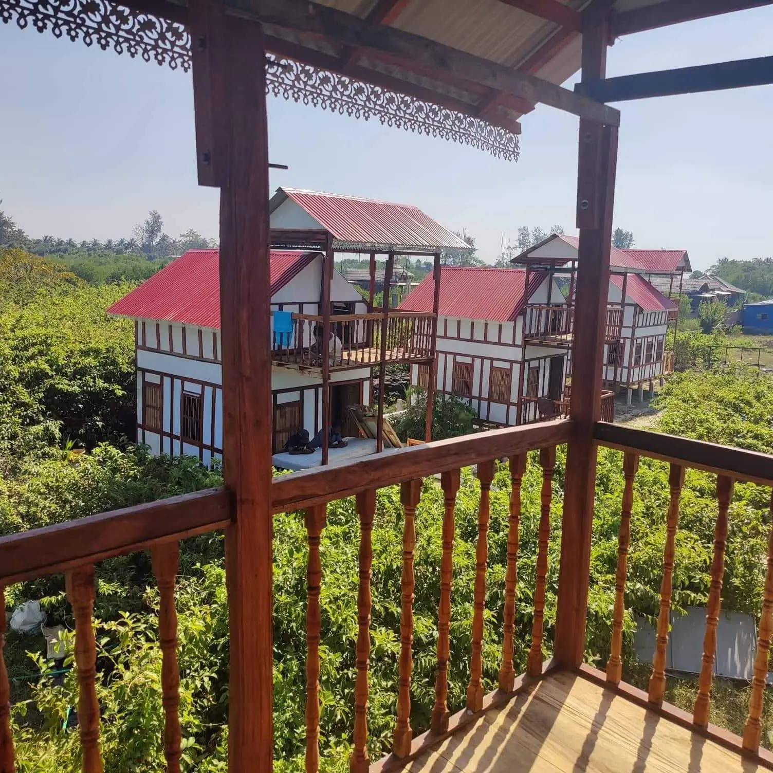 View of the neighbouring cottages from a balcony